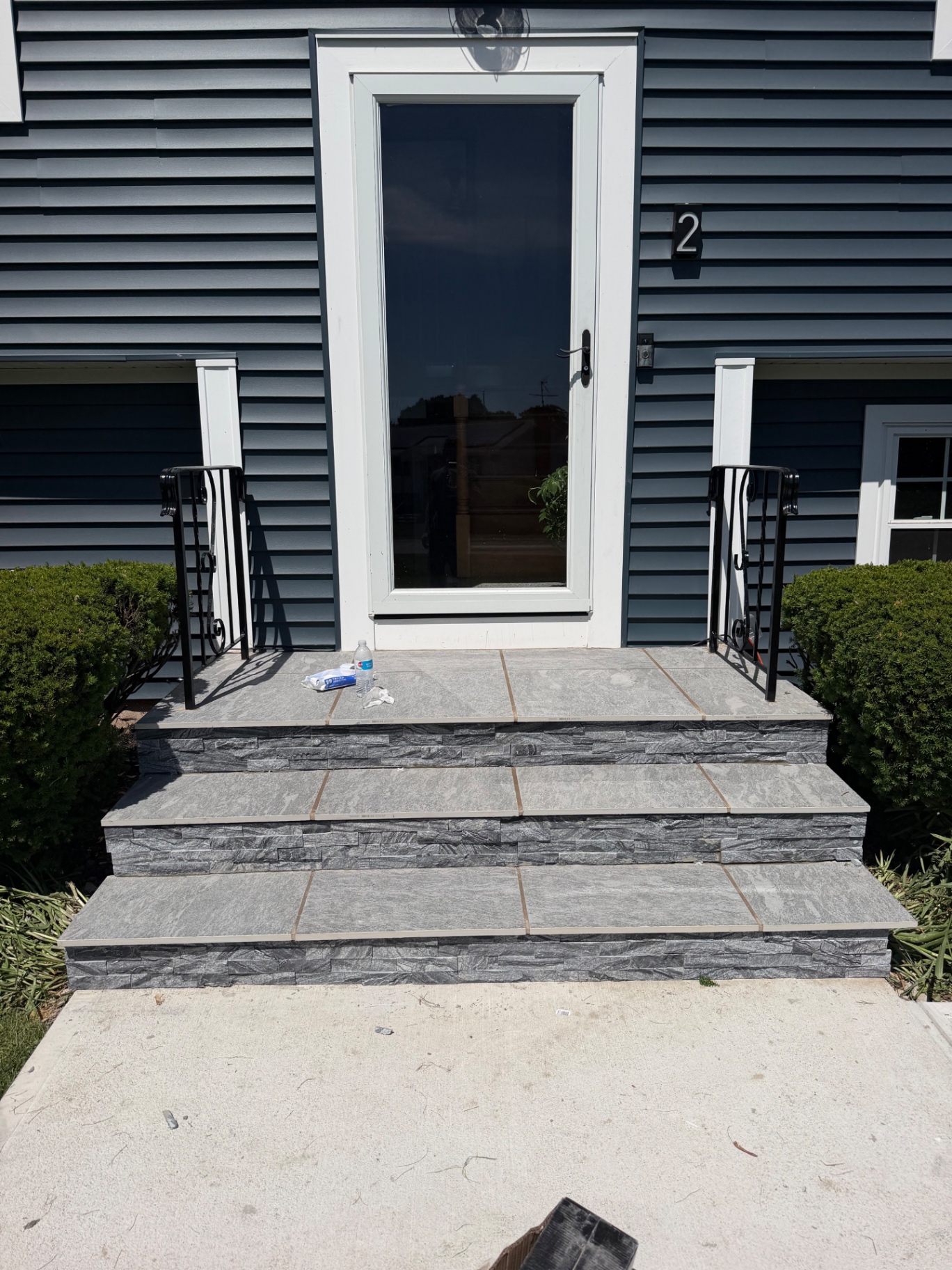 Bluestone Porch with Stone Veneer Steps